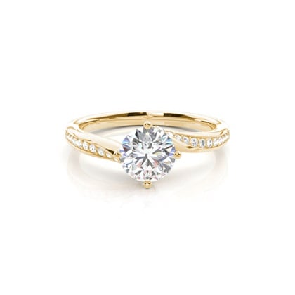 4 Prong Setting Round Diamond Side Stone Engagement Ring